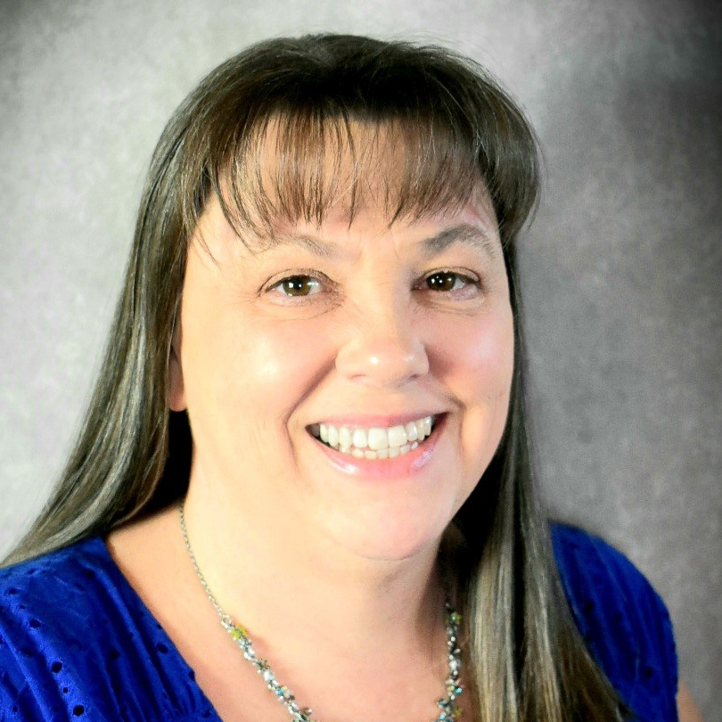 Kim Headshot 002 749x1024