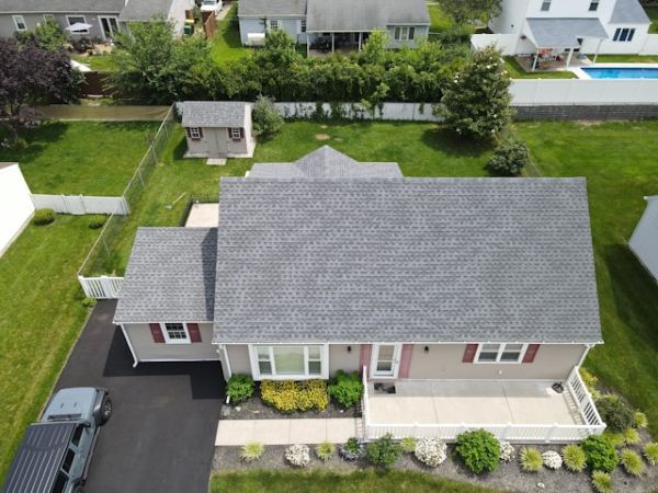 Aerial view of a suburban house with a grey roof 600 Unsplash