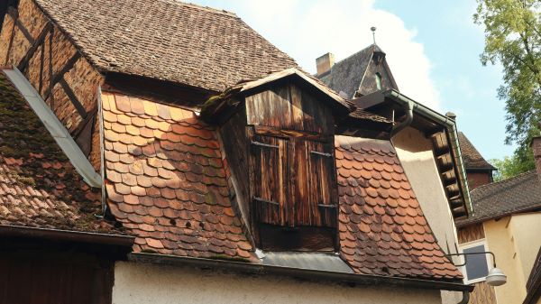 Building with red tile roof Unsplash