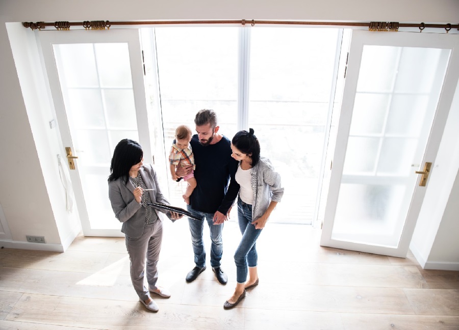 Family looking at a house
