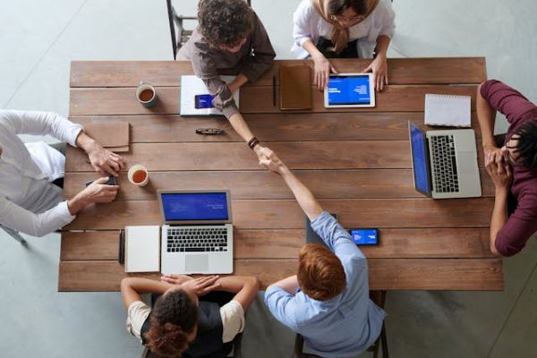 Group of people sitting indoors 600 Pexels