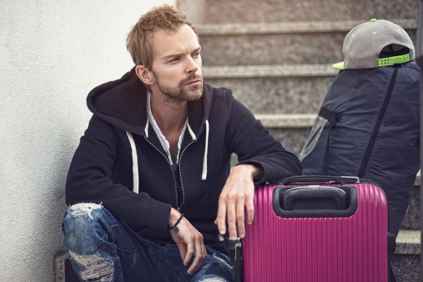 Guy with suitcase Pixabay