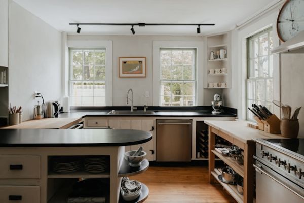 Kitchen with a clock on the wall Unsplash