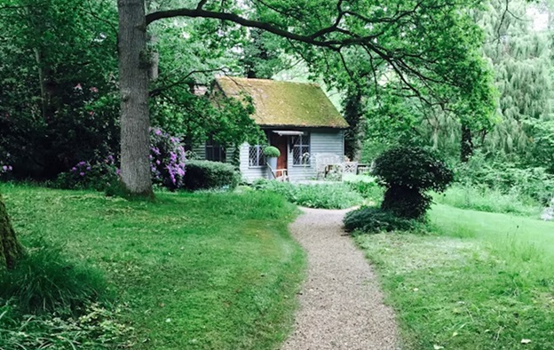 Path leading to a small house in the woods 600 Unsplash