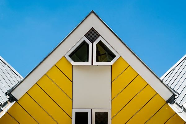Pointy yellow house roof Pixabay
