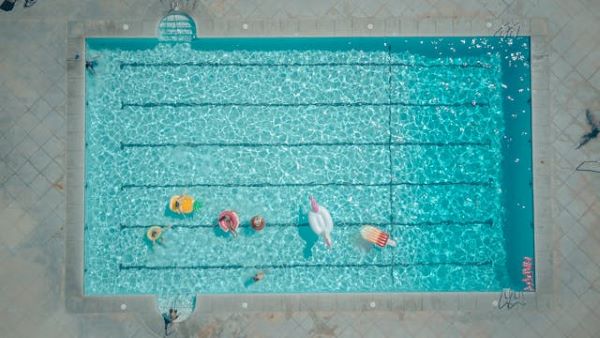 Top view of people in swimming pool 600 Pexels