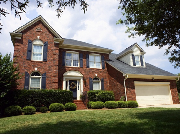 Two story brick house 600 Canva