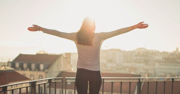 Woman in long sleeve shirt enjoying the fresh air 600 Pexels