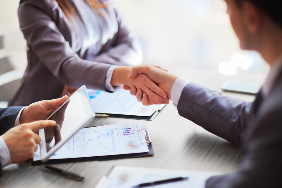 bigstock Business people shaking hands 83445530