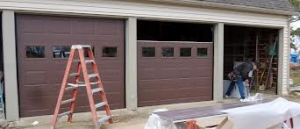 What Should I Do to Stop the Squeaky Sounds Coming from the Garage Door?