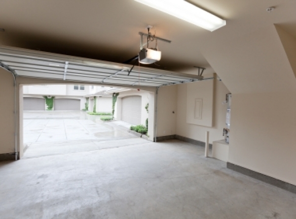 Should I Be Concerned When I Hear a Popping Sound When I Open the Garage Door?