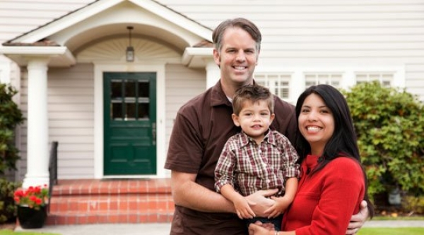 Family in front of a home