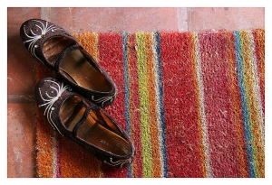 PLEASE LEAVE YOUR SHOES AT THE DOOR