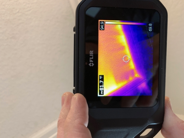 A thermal camera is a great tool for helping to identify energy efficiency issues within a home. This photo shows air leakage around the attic hatch which will lead to comfort and energy issues.