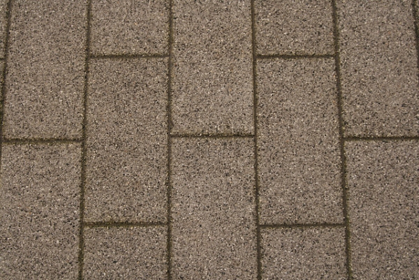 Exposed aggregate textured concrete paving