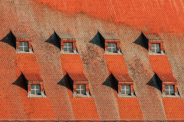 How Roof Issues Impact Property Values: A Guide for Women Realtors