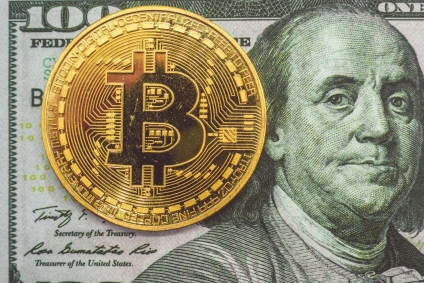 Digital Currency Versus Bitcoin and the Future of Money