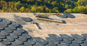 Four Rooftop Owners: Three Want to Repair; The Fourth Says “No”