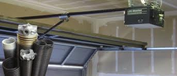 Why Do I Need a Garage Door Spring Replacement Service?
