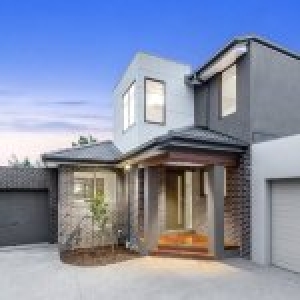 Modern Home Design Rejuvenates Duplex Concept